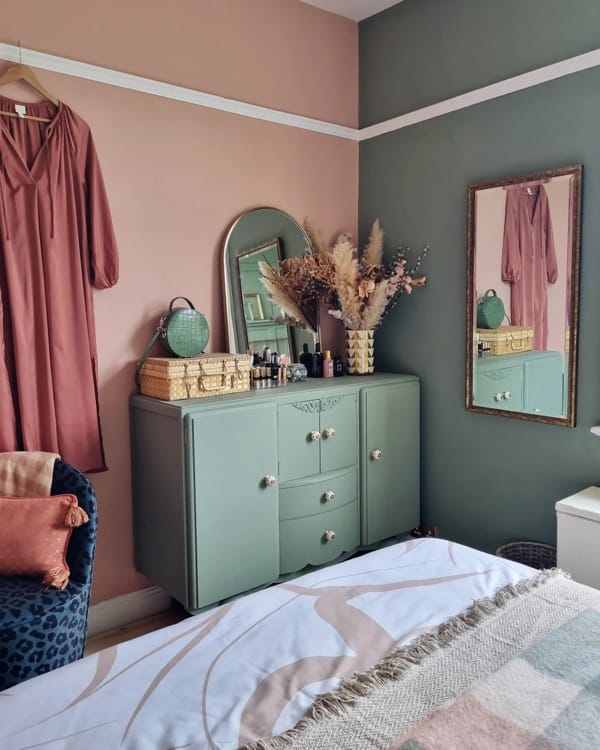 Bedroom with Different Wall Paints on Adjacent Walls and Wall Mirrors Reflecting Each Other