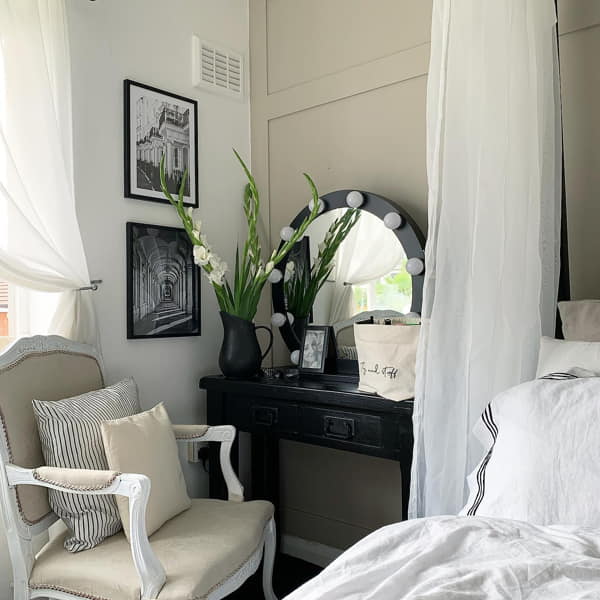 Mirror over Dresser Near the Bed