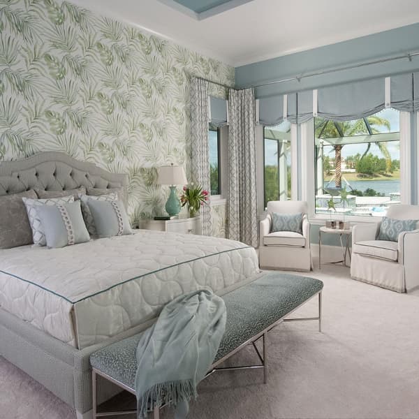 Muted Blue and Green Bedroom with Patterned Wallpaper